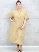 Sukienka plus size z luźnym fasonem i efektownym wiązaniem na plecach Stylowa XL