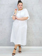 Sukienka plus size z luźnym fasonem i efektownym wiązaniem na plecach Stylowa XL