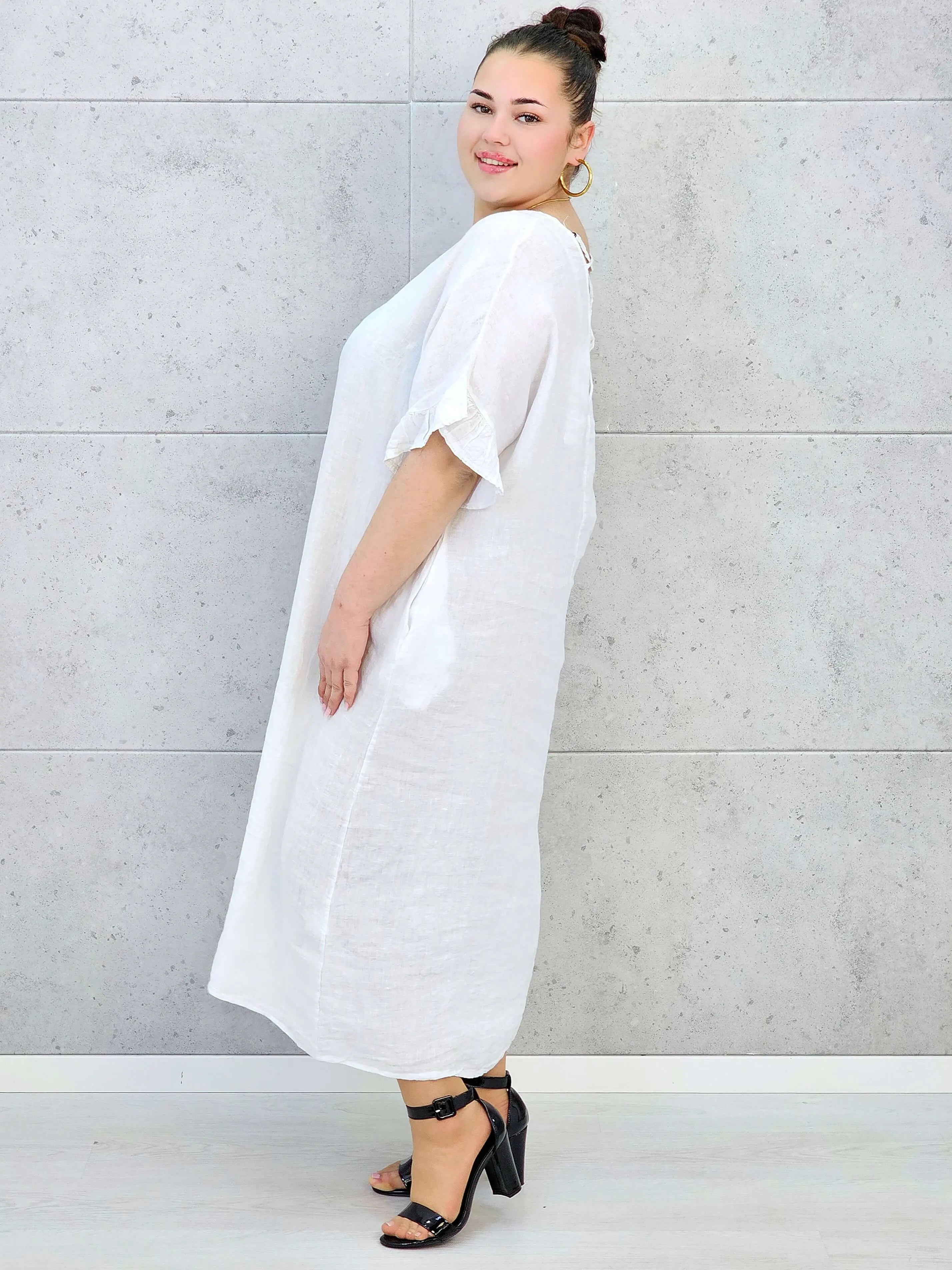 Sukienka plus size z luźnym fasonem i efektownym wiązaniem na plecach Stylowa XL