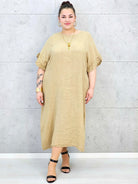 Sukienka plus size z luźnym fasonem i efektownym wiązaniem na plecach Stylowa XL