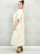 Sukienka plus size z luźnym fasonem i efektownym wiązaniem na plecach Stylowa XL