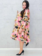 Sukienka plus size z wiązaniem – lekka i pełna energii Stylowa XL Stylowa XL