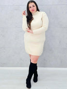 Sukienka sweterkowa z ozdobnymi guzikami na ramieniu z jednej strony Stylowa XL