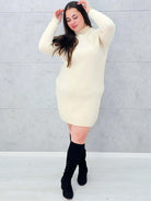 Sukienka sweterkowa z ozdobnymi guzikami na ramieniu z jednej strony Stylowa XL