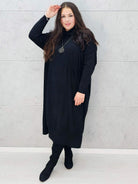 Elegancka czarna sukienka swetrowa plus size – Stylowa XL