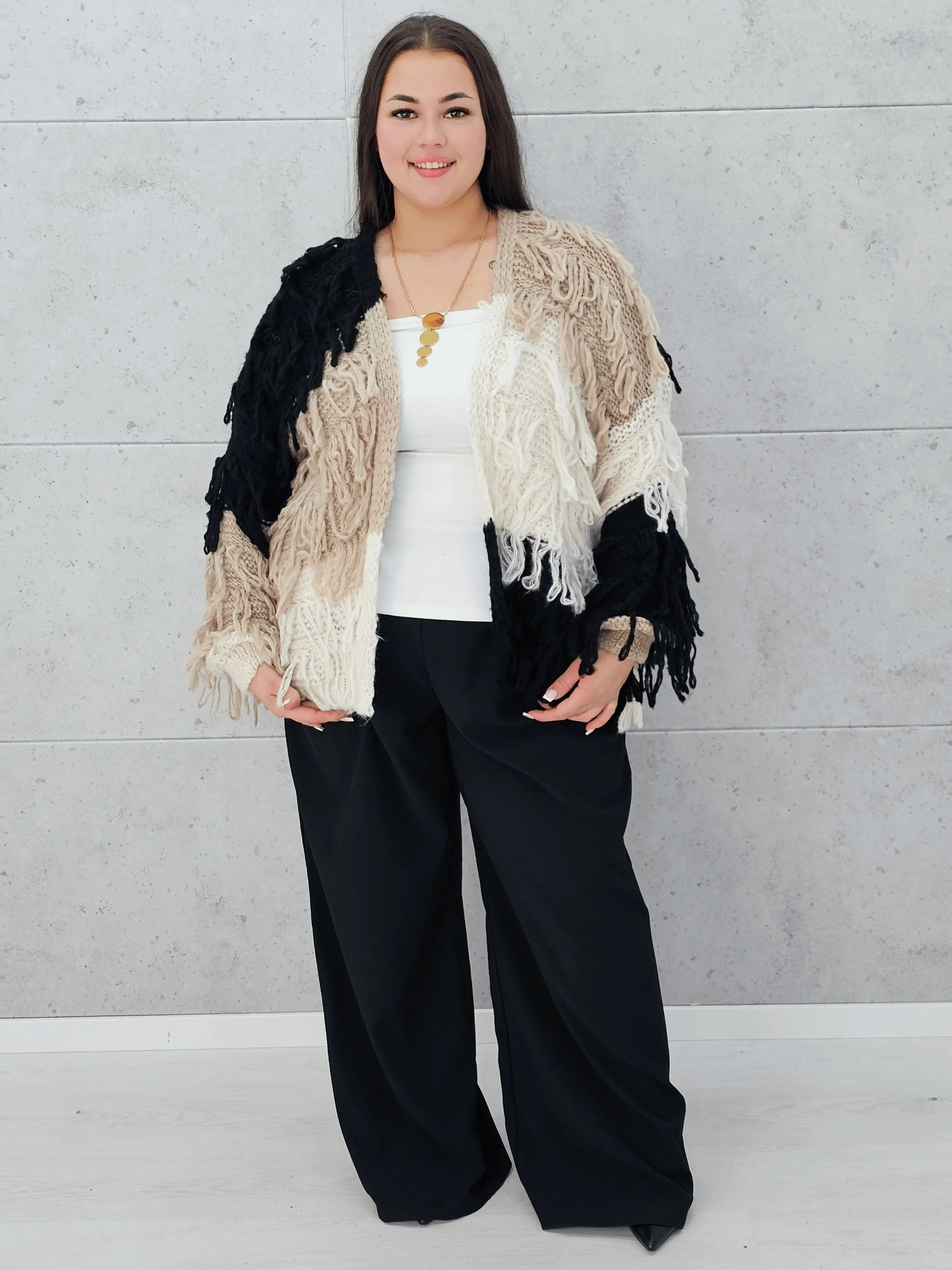 Sweter plus size – ciepły, stylowy i idealnie dopasowany do kobiecej sylwetki Stylowa XL