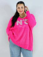 Sweter plus size z aplikacją – styl i wygoda w jednym  Stylowa XL Stylowa XL