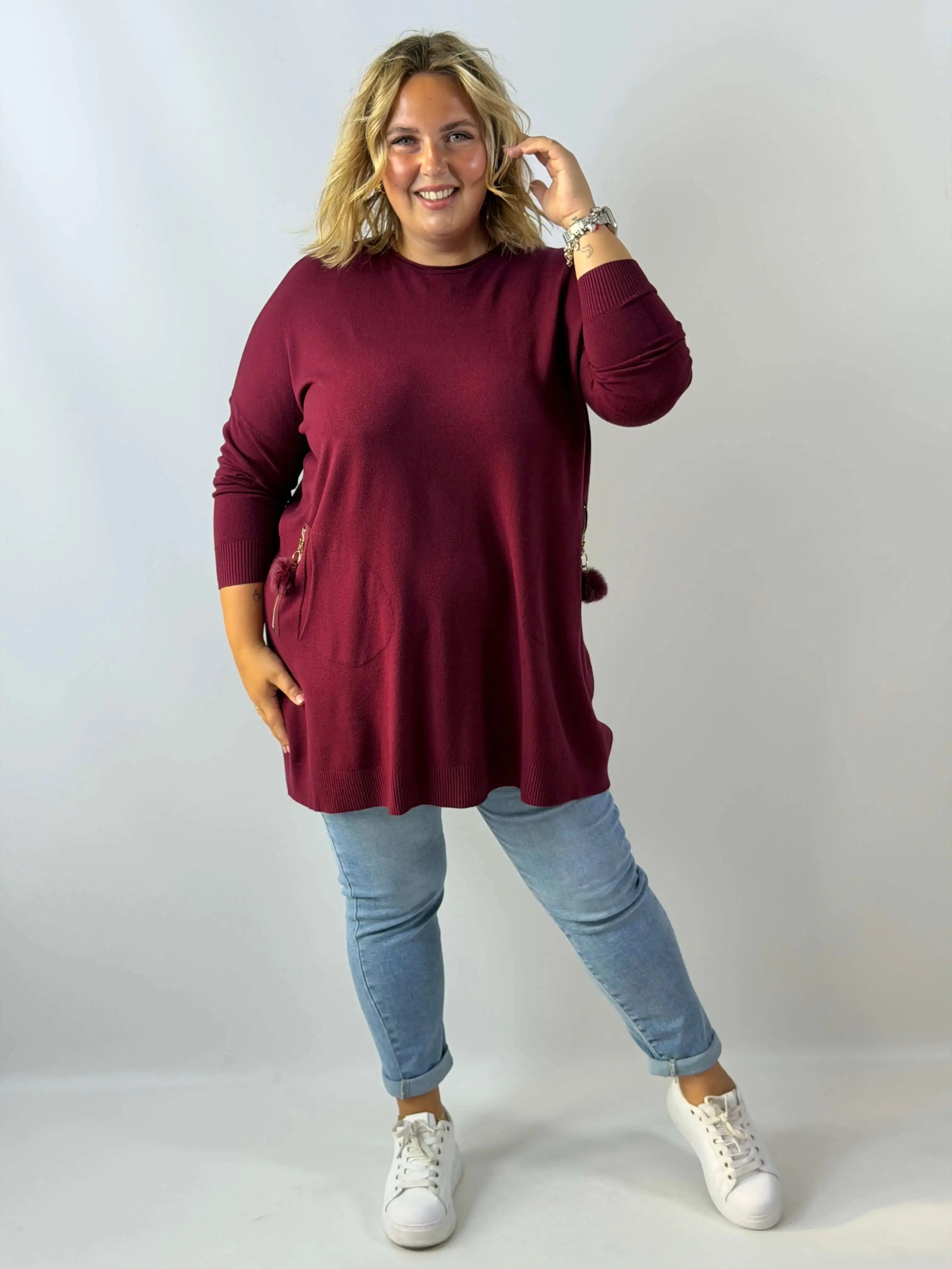 Tunika sweterkowa Plus Size z kieszeniami i ozdobnym pomponem Stylowa XL