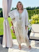 Wyjątkowa sukienka z misternym haftem Stylowa XL