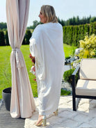 Wyjątkowa sukienka z misternym haftem Stylowa XL