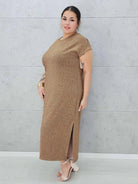 Złocista sukienka z połyskiem Stylowa XL