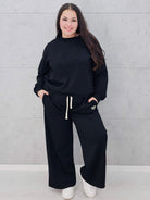 Dres plus size z szerokimi spodniami – komfortowa moda XXL na co dzień i wyjątkowe okazje Stylowa XL